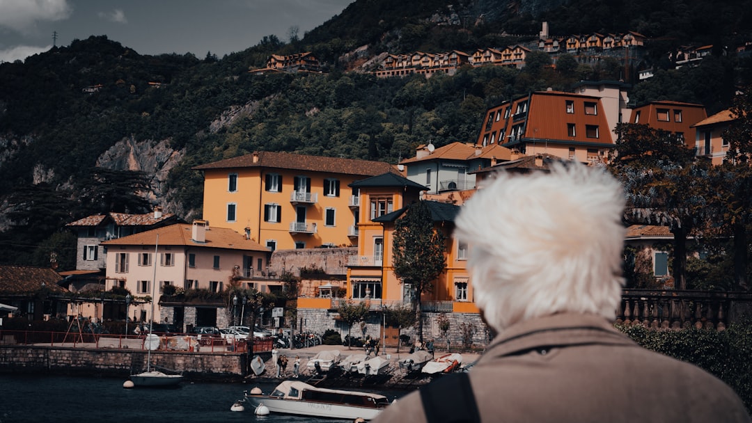A man standing next to a body of water